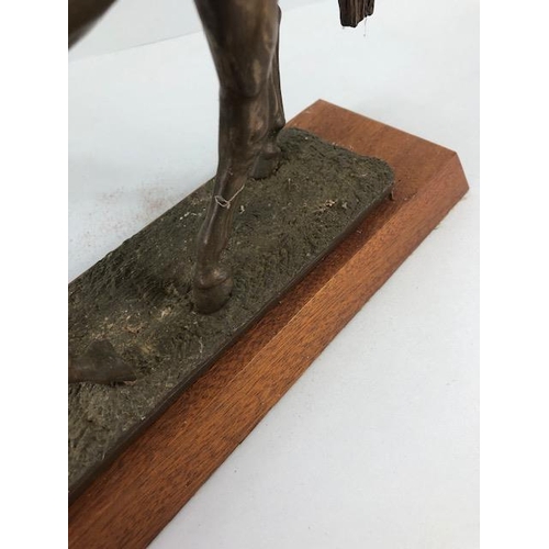 105 - Vintage Bronze finish cold cast metal statue of a horse on a wooden plinth, approximately 26 cm high