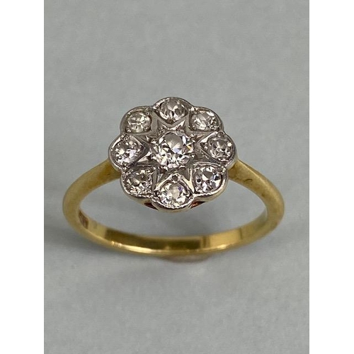 11 - 18ct yellow gold daisy cluster ring set with 9 diamonds in white gold approximately 2.4 g size K