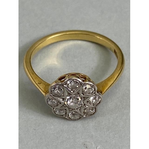 11 - 18ct yellow gold daisy cluster ring set with 9 diamonds in white gold approximately 2.4 g size K