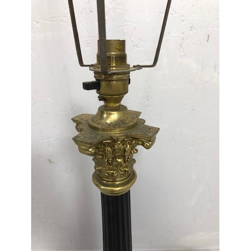 113 - Vintage Lighting, Corinthian column lamp base of gilded and blackened metal along with its shade cag... 