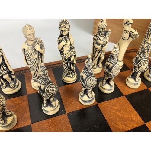 117 - Vintage Chess sets, two composite material Imperial roman chess sets in a wooden cases and Two chess... 