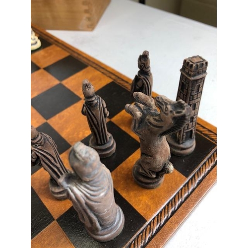 117 - Vintage Chess sets, two composite material Imperial roman chess sets in a wooden cases and Two chess... 