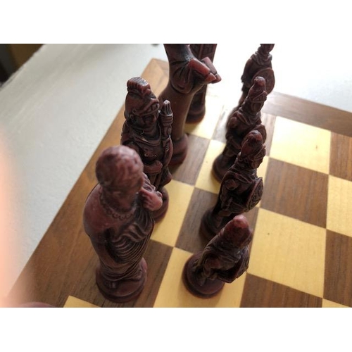 117 - Vintage Chess sets, two composite material Imperial roman chess sets in a wooden cases and Two chess... 