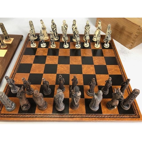 117 - Vintage Chess sets, two composite material Imperial roman chess sets in a wooden cases and Two chess... 