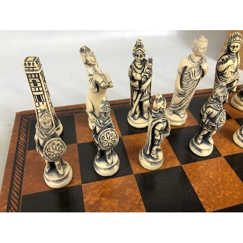 117 - Vintage Chess sets, two composite material Imperial roman chess sets in a wooden cases and Two chess... 