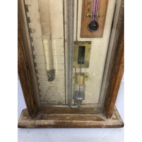 124 - Antique Admiral FitzRoy Barometer in blonde oak gothic style case, A F approximately 120cm in length