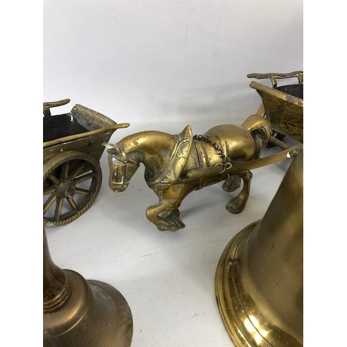 131 - Vintage Brass ware, to include a pair of heavy horses pulling carts and Four bells, (the larger with... 