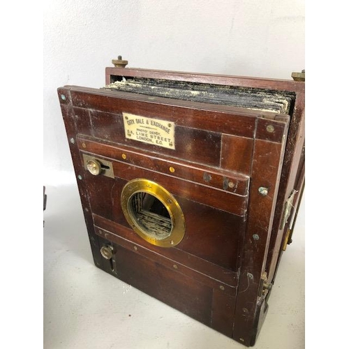 132 - Antique Camera, mahogany and brass, plate glass camera parts including  two  lenses one marked Pione... 