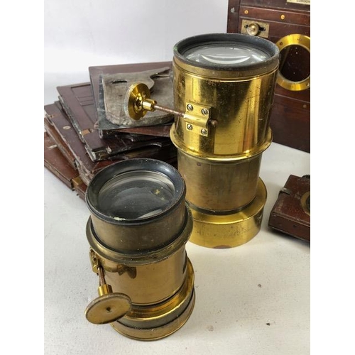 132 - Antique Camera, mahogany and brass, plate glass camera parts including  two  lenses one marked Pione... 