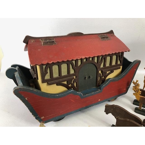 145 - Noah's Ark, early 20th century German flat bottom wooden ark on wheels with a collection of 31 cut o... 