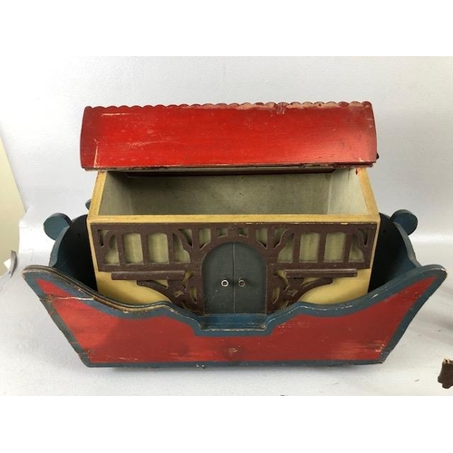 145 - Noah's Ark, early 20th century German flat bottom wooden ark on wheels with a collection of 31 cut o... 