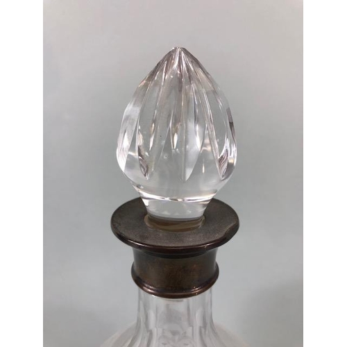 151 - Cut glass decanter with English hallmarked Silver collar approximately 30cm high