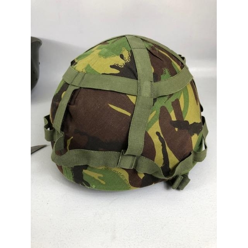 153 - Militaria interest, British Mk 6 Helmet with cover, WW2 German Helmet reissued to the Spanish, 2 x S... 