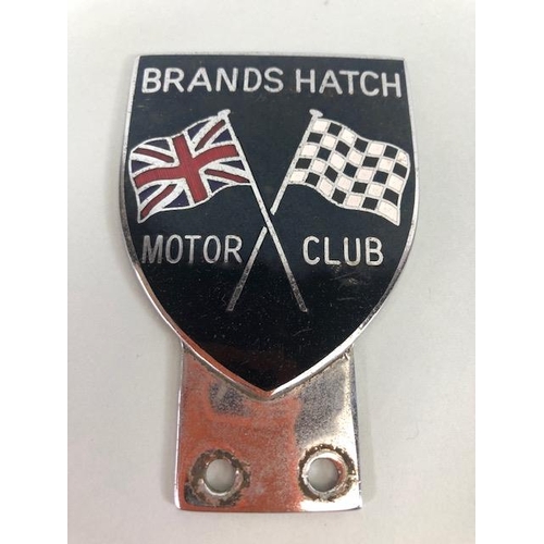 160 - Motoring Automobilia interest, vintage AA 2 piece  bar badge and an enamel Brands Hatch Motor Club b... 