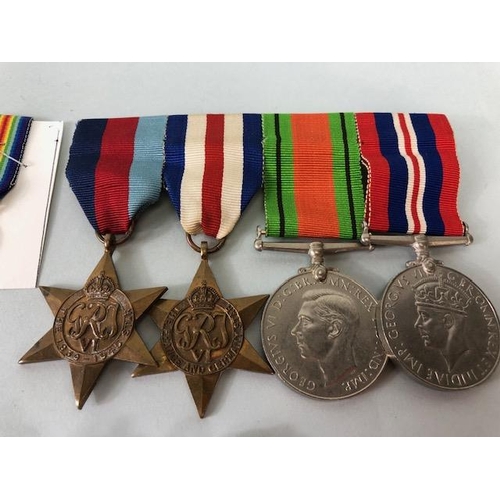 165 - Military interest, WW2 British medal group being 39-45 star, France and Germany Star, Defence Medal ... 