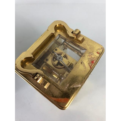 174 - Vintage carriage clock of brass with clear panels, white dial with roman numerals approximately 11cm... 