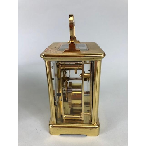 174 - Vintage carriage clock of brass with clear panels, white dial with roman numerals approximately 11cm... 