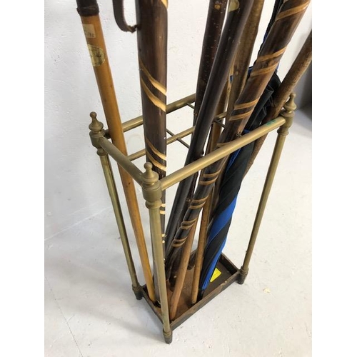 187 - Collection of vintage walking sticks and hiking poles in a Victorian style brass stand 10 items tota... 