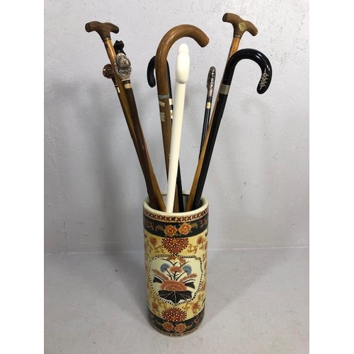 189 - Collection of vintage walking sticks , animal head tops, horn,stone set, white metal, in a oriental ... 