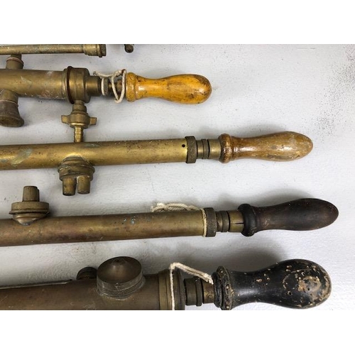 192 - Collection of Antique and vintage brass garden sprayers, seven in total various makers and a cast st... 