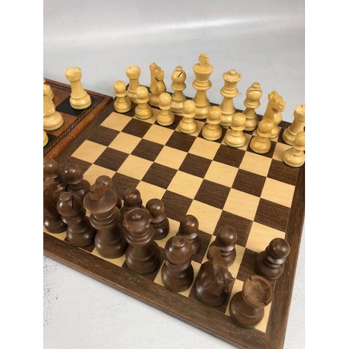 198 - Vintage chess sets, two boxwood chess sets with boards, one approximately 30 x 30cm the other 40 x 4... 