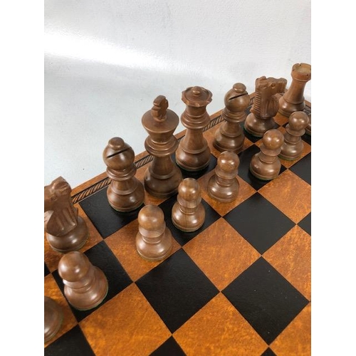 198 - Vintage chess sets, two boxwood chess sets with boards, one approximately 30 x 30cm the other 40 x 4... 