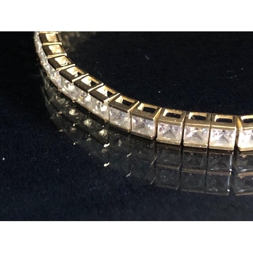 20 - 9ct Gold Tennis style bracelet marked 375 CZ and approx 19cm in length total weight 9.9g