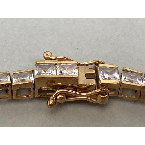 20 - 9ct Gold Tennis style bracelet marked 375 CZ and approx 19cm in length total weight 9.9g