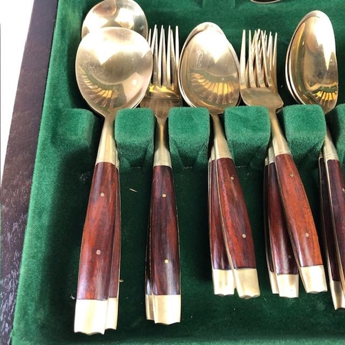 203 - Vintage Cutlery, a 44 piece canteen of mid century bronze and teak cutlery in its fitted case ( old ... 