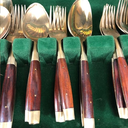 203 - Vintage Cutlery, a 44 piece canteen of mid century bronze and teak cutlery in its fitted case ( old ... 