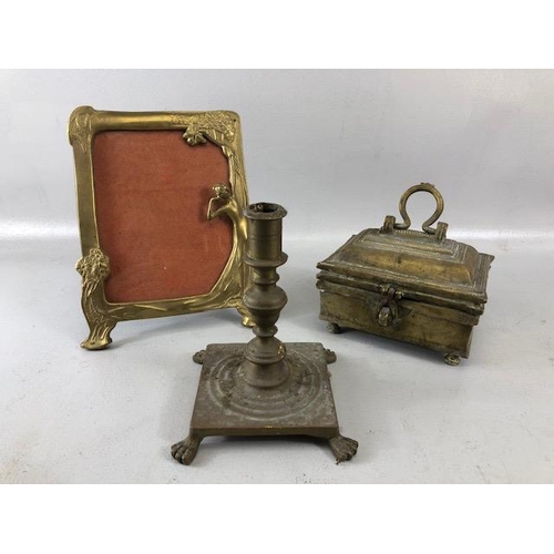 206 - Vintage Brass ware: an Art Nouveau picture frame, beetle nut box, and a candle holder with lion paw ... 