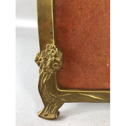 206 - Vintage Brass ware: an Art Nouveau picture frame, beetle nut box, and a candle holder with lion paw ... 