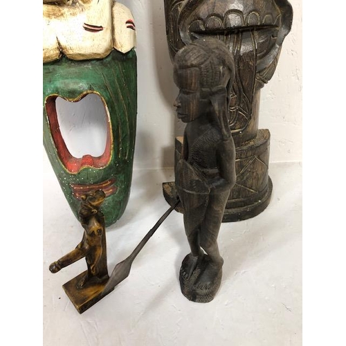 208 - Decorative tribal interest, two large carved wall masks, African figure and an Egyptian fertility fi... 