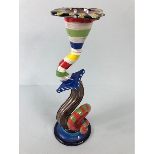 209 - Ross Emerson Art ceramics, being Two twisty candle sticks  in multi colour ways approximately 24 and... 