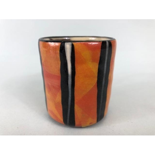 210 - Ross Emerson Art Ceramics, Blue striped jug approximately 16cm high, Tripod  sauce boat in orange, y... 