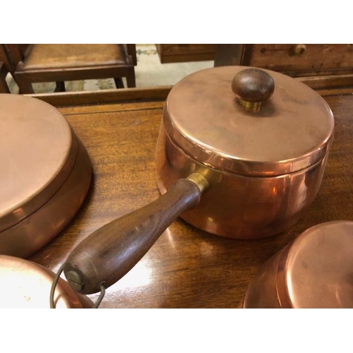 217 - Vintage Retro mid century set of Copper pans with teak handles, comprising three sauce pans and one ... 