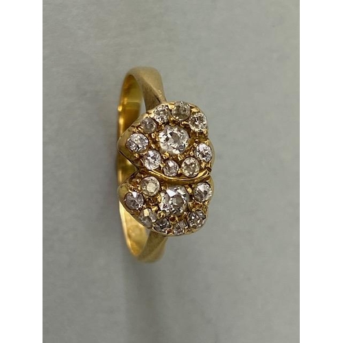 22 - 18ct  yellow gold ring of 2 joined heart shaped cluster settings set with diamonds approximately 2.7... 