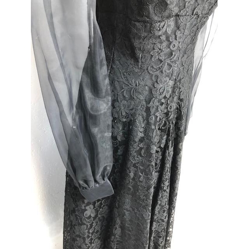 222 - Vintage clothing late 20th century full length evening dress of of black lace with chiffon sleaves, ... 