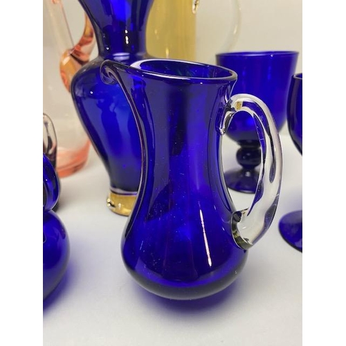 244 - Art glass, collection of water pitchers, jugs, vase, goblets, Bristol blue and other colours 8 items