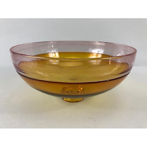 245 - Art Studio glass, Three amber glass bowls all with ground bases one with a signature