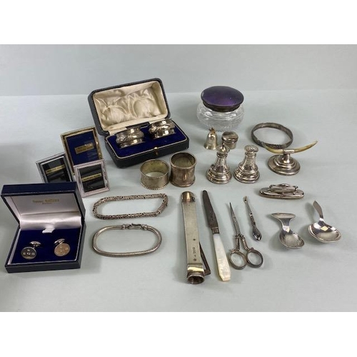 25 - Quantity of silver items to include cigar cutter, napkin rings, bracelet's etc