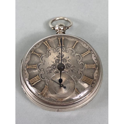 26 - Silver hall marked Gents dress pocket watch , engine turned and engraved dial with gold roman numera... 