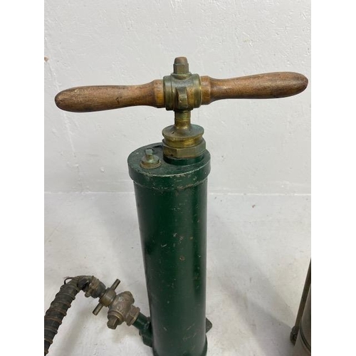 277 - Decorators interest, two antique hand extinguisher pumps, one copper the other metal, with copper an... 