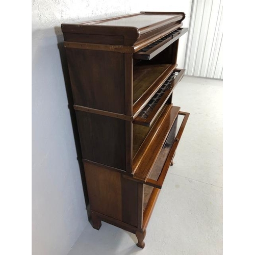 306 - Three section Globe Wernicke bookcase with two leaded glazed panel doors, the lower stepped case wit... 