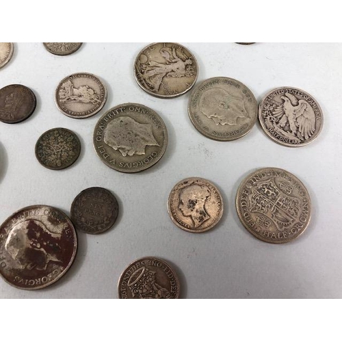 31 - Collectable coins to include silver coins, half dollars etc approx 300g