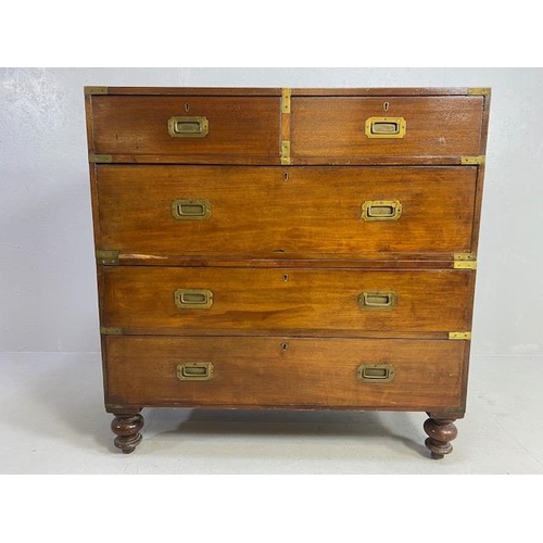 314 - Campaign chest of five drawers, spilts into two sections each with Brass bindings and corners and or... 