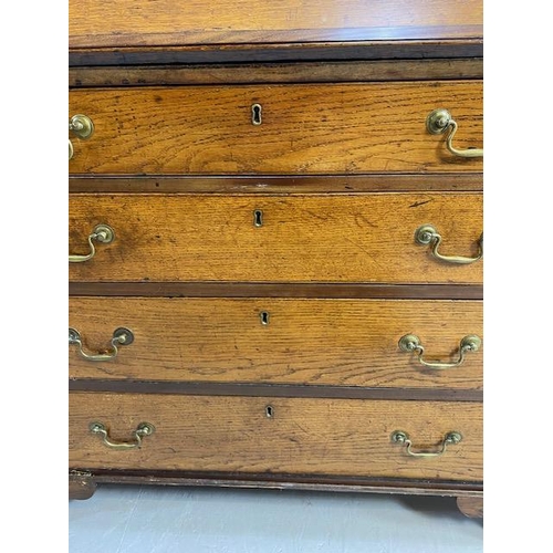 316 - Oak Bureau with four drawers, fall front revealing pigeon holes and ornate key to lock