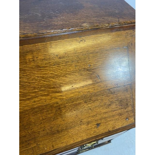 316 - Oak Bureau with four drawers, fall front revealing pigeon holes and ornate key to lock