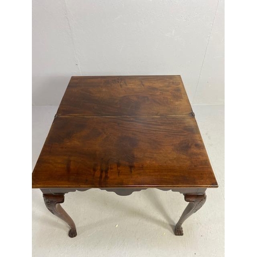 317 - Victorian side table with folding leaf extending to make a tea table in flame mahogany with lion paw... 