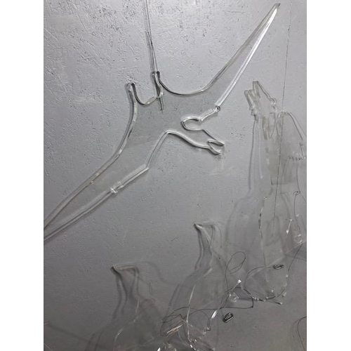 322 - Shop or decorators display items, a quantity of oversized clear perspex bird and flying Jurassic cre... 